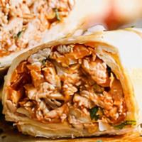 Chicken Wrap · Seasoned Chicken Grilled with Onions, potato, green peppers and mixed vegetables wrapped on ...