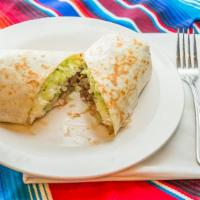 Veggie Burrito · A giant flour tortilla filled with refried beans, sour cream, lettuce, tomatoes, cheese, and...