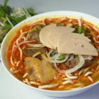 Bun Bo Hue · Spicy. Hot and spicy beef noodle soup with pork ham hock.