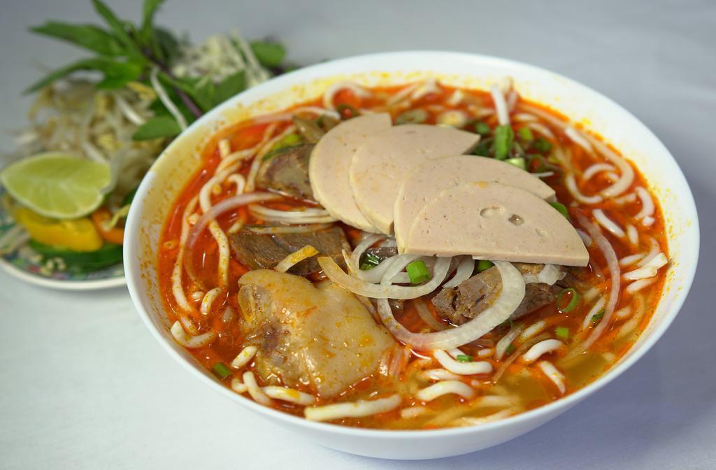 Bun Bo Hue · Spicy. Hot and spicy beef noodle soup with pork ham hock.