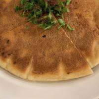 Arayes With Cheese · Fresh baked pita bread stuffed with syrian cheese.