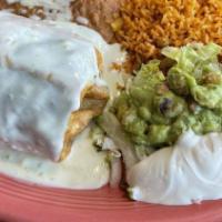 Chimichanga · A flour tortilla deep - fried, filled with beef or chicken and topped with cheese and guacam...