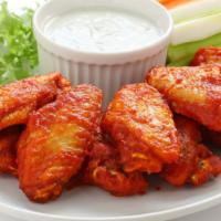 Buffalo Wings · 5 pieces of crispy Chicken Wings, tossed in Buffalo sauce, and battered and fried to perfect...