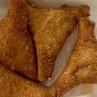  Crab Cheese Rangoon - 4 Pieces · Crabmeat, cream and green onion shaped as a triangle, wrapped and deep fried. Served with ho...