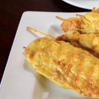  Satay Gai-4 Pieces · Chicken marinated in Thai herbs and spices on skewers grilled. Served with peanut sauce and ...