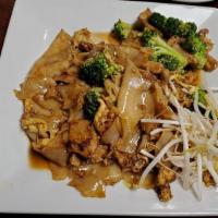 Pad Sew Ew · Thai Ocha favorite: Sautéed wide fresh rice noodle with choice of meat, egg, broccoli and be...