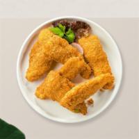 Chicken Tenders · Chicken tenders breaded and fried until golden brown. Served with your choice of dipping sau...