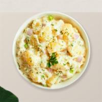 Mashed Potato · (Vegetarian) Mashed Idaho potatoes cooked, seasoned with garlic, butter, and topped with cri...