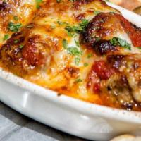 Meatballs · Five pork and Charcuterie meatballs in tomato basil sauce, with melted mozzarella and parmig...