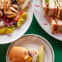 Club Sandwich · Triple decker with turkey, ham, bacon, lettuce, tomato, and mayo.