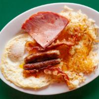 #5 The Grand Slam · Three eggs, ham, bacon, and sausage, served with hash browns or grits, and toast.