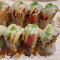 K18 G-Vegas Roll · Spicy salmon,avocado,cucumber and crunch inside, topped with seared black pepper tuna, wasab...