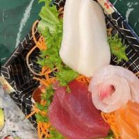 L 2. Sashimi Lunch · 12 pcs assorted raw fish with white rice.