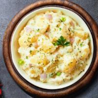 Got Mashed Up (Mashed Potato) · (Vegetarian) Mashed Idaho potatoes cooked, seasoned with garlic, butter, and topped with cri...