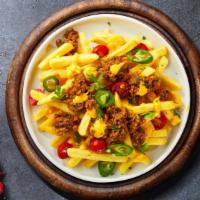 Cheesy Billy Chili Fries · Idaho potato fries cooked until golden brown and garnished with salt, melted cheddar cheese,...
