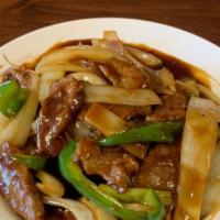 Mongolian Beef · Hot & spicy. Sliced tender beef sautéed with a combination of onions, green pepper, and bamb...
