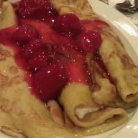 Strawberry Nutella Crepes · 3 french style crepes filled with fresh strawberries and Nutella hazelnut spread