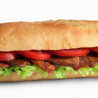 Blt · Thick-cut smoked bacon, lettuce, Roma tomatoes, mayo.