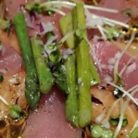 Chirashi Assorted · Raw fish sashimi on a bed rice (chef's choice).