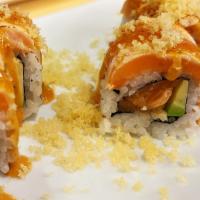 J307. Salmon Lover · Fresh salmon & avocado inside, topped with seared spicy salmon & tempura crunchy.

These foo...