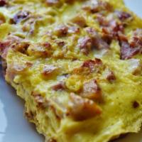 Meat Lovers Omelette · Bacon, sausage, ham of the bone, american cheese