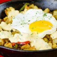 Veggie Skillet · Spinach, mushrooms, tomatoes, green peppers, onions, American cheese, two eggs.