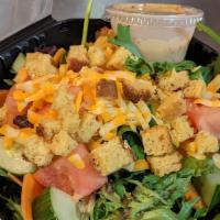 Simple · Mixed greens, sliced carrot, cheddar jack, cucumber, tomato, cornbread croutons, honey musta...