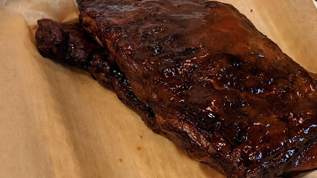 Full Rack Of Ribs · Baby Back or St. Louis, Dry Rubbed or Glazed