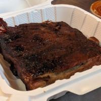 1/4 Rack Ribs · Baby Back or St. Louis, Dry Rubbed or Glazed