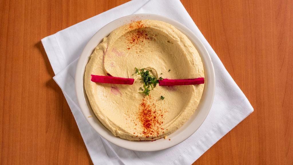 Hummus · Vegetarian. Mashed chick peas with sesame seed sauce.
