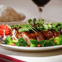 Spt'S Roasted Duck · Boneless roasted duck served with steamed broccoli and house sauce. Include jasmine rice.