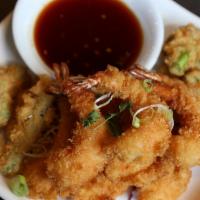 Thai Fried Shrimp · Deep fried shrimps in lightly batter served with homemade sweet and sour sauce.