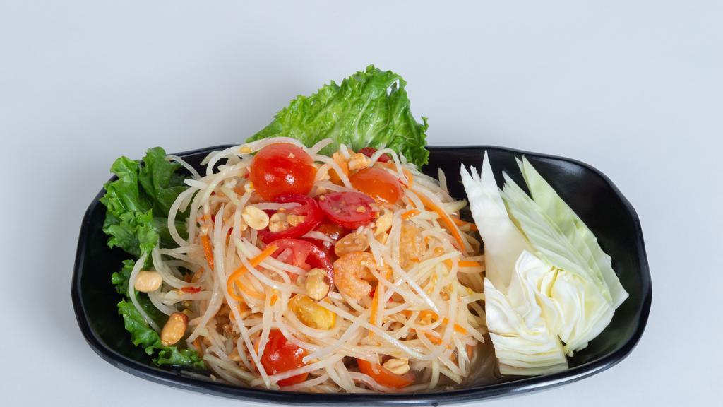 Papaya Salad (Spicy) · Shredded green papaya mixed fresh or dried shrimps or salty crab, green beans, tomatoes,  and spicy lime sauce.