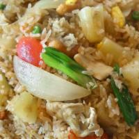 Pineapple Fried Rice · Selected meat, seafood or vegetables and tofu, with pineapple, soy sauce, onions, peas, toma...