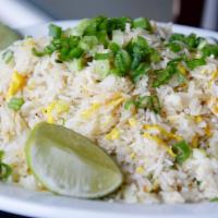 Crab Meat Fried Rice · Thai style fried rice with crab meat, soy sauce, butter, egg, peas, onions, and green onions.