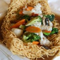 Crispy Egg Noodles (Rad Nah Mee-Krob) · Selected meat, seafood or vegetables and tofu, broccoli, mushrooms, carrots in a special gra...