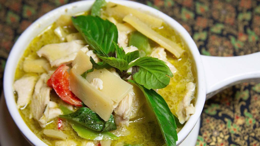 Green Curry (Spicy) · A popular Thai green curry cooked with coconut milk, basil, bell peppers, lime leaves, and bamboo shoots.