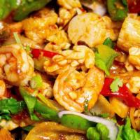 Seafood Combination (Spicy) · Jumbo shrimps, squids, mussels, scallops, and catfish stir-fried with onions, bell peppers, ...