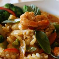 Pineapple Seafood (Spicy) · Jumbo shrimps, squids, mussels, scallops, and catfish sauteed with a red curry sauce, coconu...