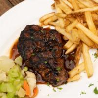 Char-Grilled Lamb Chops · Includes tender lamb chops marinated in garlic, olive oil, lemon and oregano and char grille...