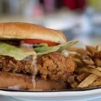 Chicken Sandwich · Marinated chicken breast lettuce tomato and pickle special sauce.