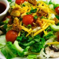 Dinner Salad · Mixed greens, tomato, cheddar cheese, mushroom, green pepper, cucumber, green onion and crou...