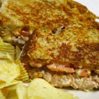 Keys' Tuna Melt · Our classic grilled cheese with our homemade tuna salad, tomato and American cheese blend on...