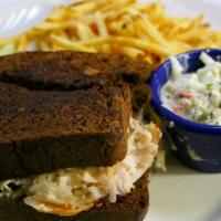 Keys' Sandwich · Turkey or corned beef with swiss cheese, sauerkraut and 1000 island dressing. Served on gril...