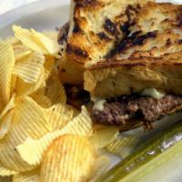 Patty Melt  · Burger patty between grilled homemade wheat with grilled onion and melted cheese.