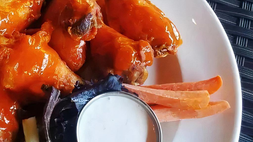 Chicken Wings · Fried, tossed with choice of sauce: Buffalo / House BBQ / Buffalo BBQ / Celery / Carrots / Ranch dressing