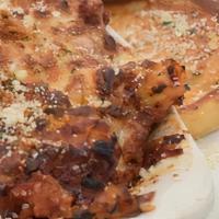 Baked Graziano Rigatoni · Graziano Italian sausage / Mozzarella / Parmesan / House marinara / Rigatoni / Garlic toast