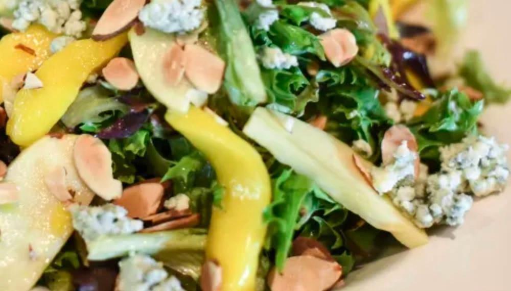 Honey Citrus · Mixed greens / Granny Smith apples / Sliced mangos / Blue cheese crumbles / Toasted almonds / Honey lime vinaigrette