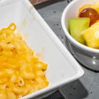 Kids Mac 'N Cheese · Mac 'n cheese sauce / Macaroni pasta / Choice of side  / Add bacon 1.99 / Add chicken 3.99