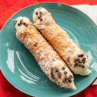 Italian Cannoli · Crispy Italian pastry filled with sweet cream and chocolate bits then dusted with confection...